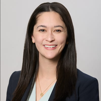 Headshot of one of our doctors, Dr. Grace Gillen, smiling