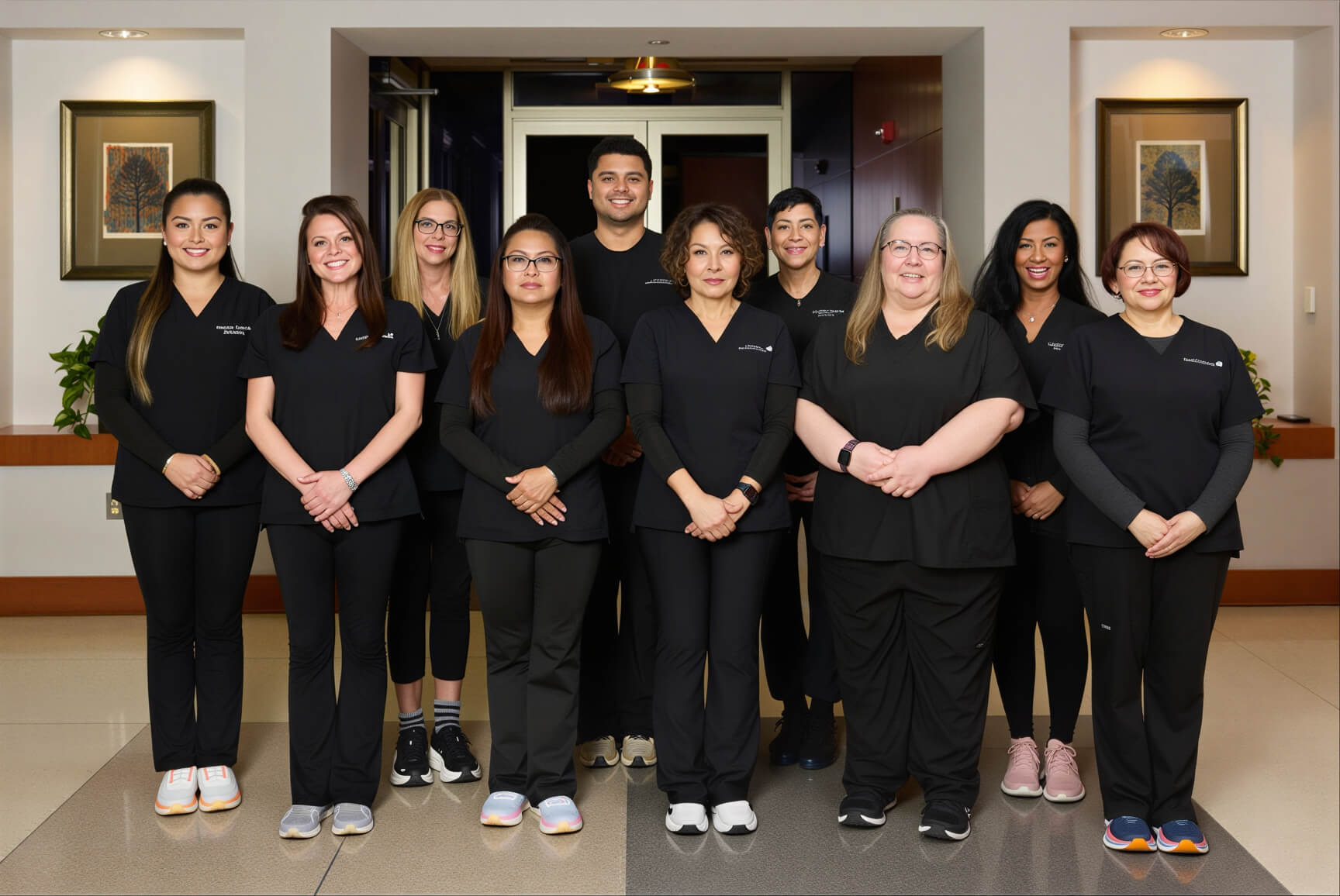 Our Reston team all standing together and smiling