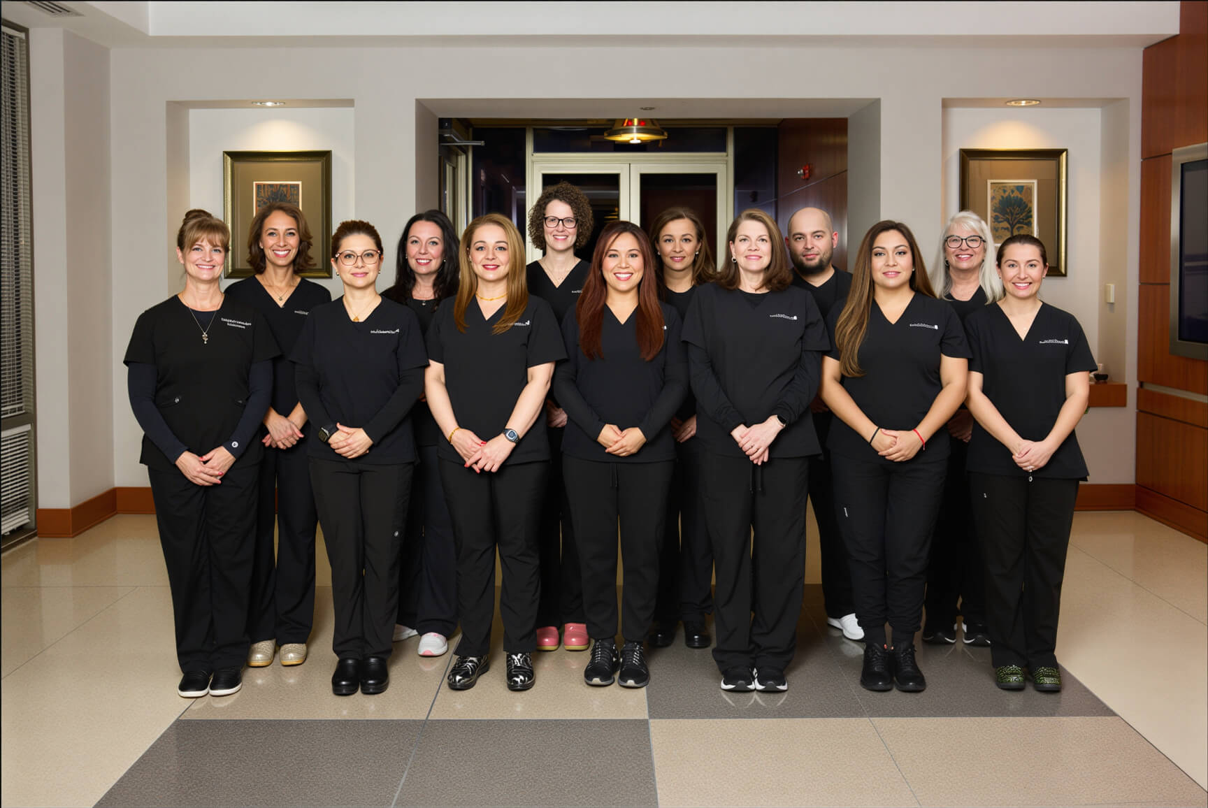 Our Reston team all standing together and smiling